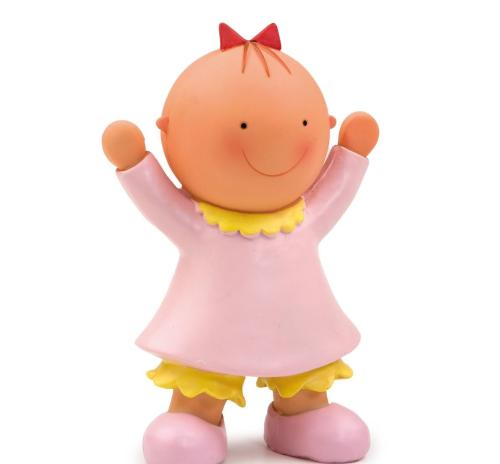 un sujet petite fille avec une robe rose et une couette
